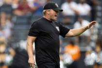 Raiders head coach Jon Gruden calls a play during a special training camp practice for season t ...