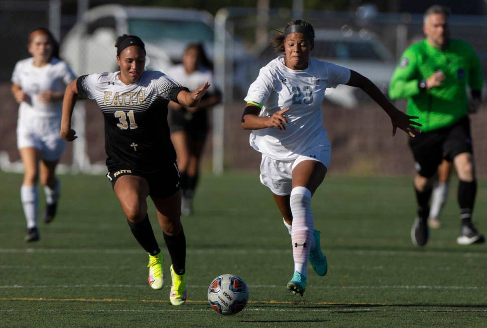 Arbor View’s Tiana Beavers (23) pushes the ball up field past Faith Lutheran’s Br ...