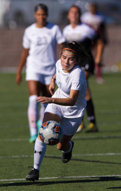 Arbor View’s Carissa Ortega (7) pushes ball up field during a girls high school soccer g ...