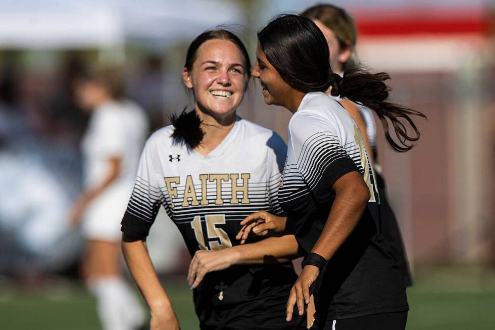 Faith Lutheran’s Serene Gronauer (15) and Andrea Leyva (10) celebrate a goal during a gi ...