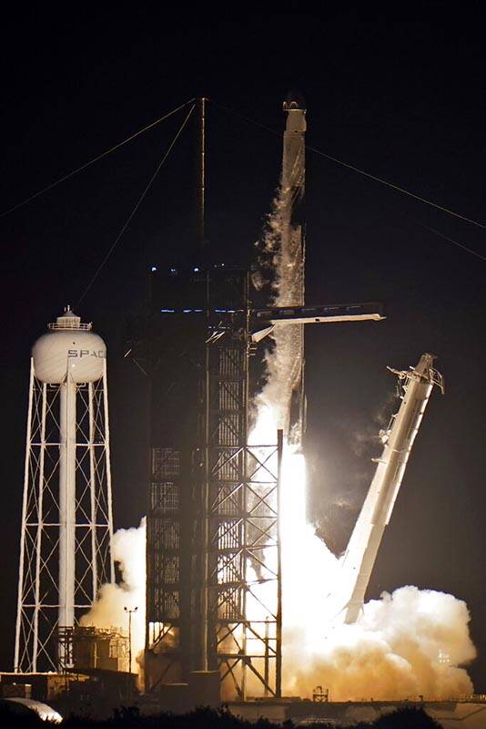 A SpaceX Falcon 9 rocket, with four private citizens onboard, lifts off from Kennedy Space Cent ...
