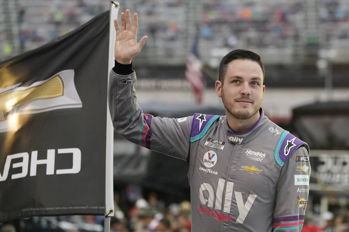 Alex Bowman waves to fans before a NASCAR Cup Series auto race at Bristol Motor Speedway Saturd ...