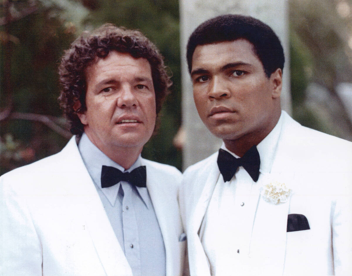 Muhammah Ali with manager and longtime friend Gene Kilroy, at a 1976 event where Ali was being ...