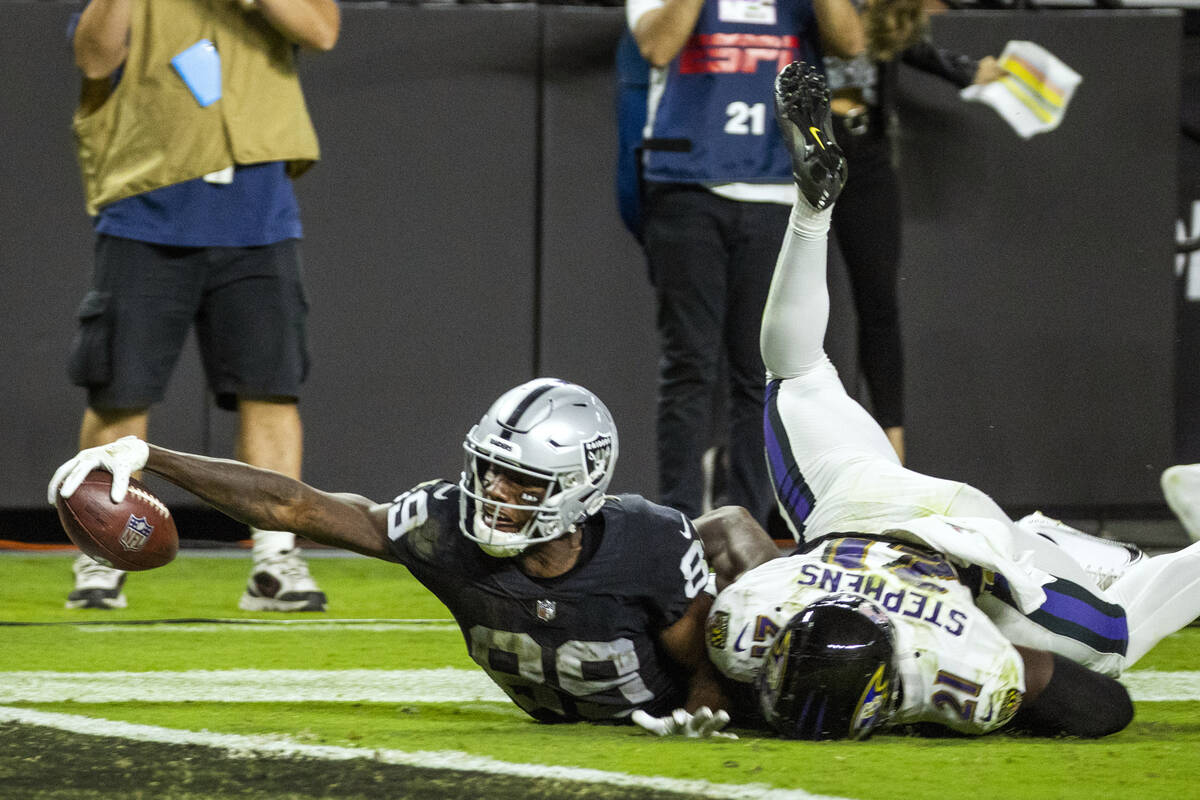 Raiders wide receiver Bryan Edwards (89) extends for a near score with Baltimore Ravens cornerb ...