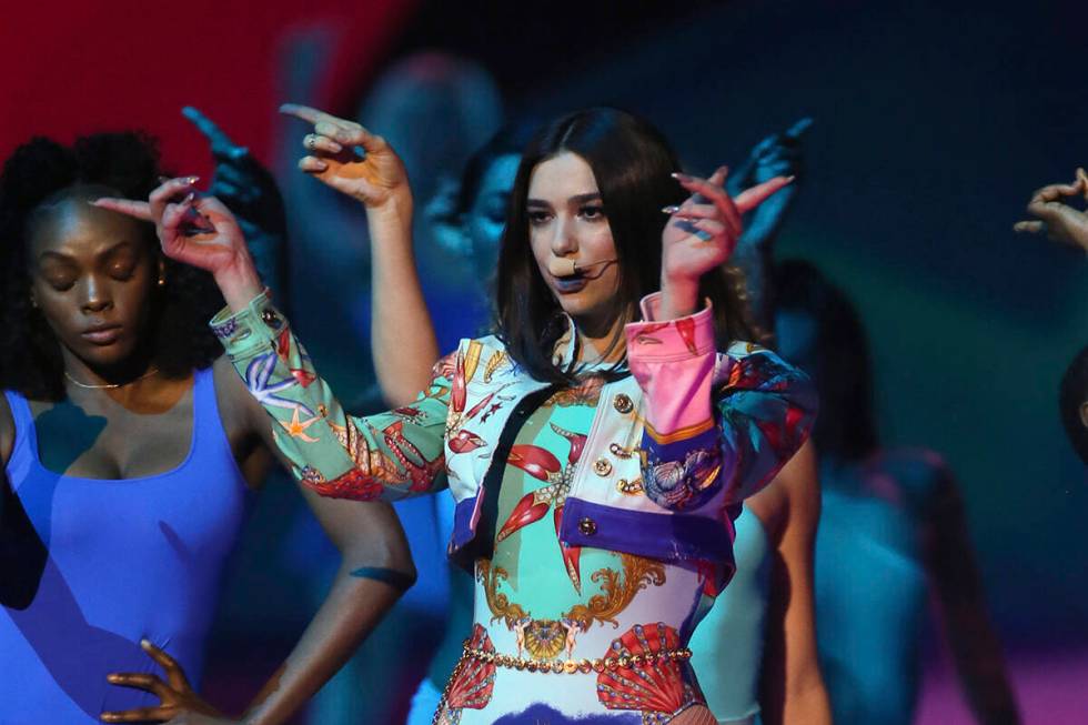 Dua Lipa performs at the Brit Awards 2018 in London, Wednesday, Feb. 21, 2018. (Photo by Joel C ...
