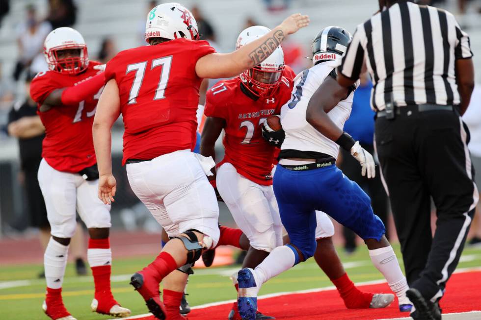 Arbor View's Makhai Donaldson (27) rushes the ball for a touchdown in the first half of a footb ...