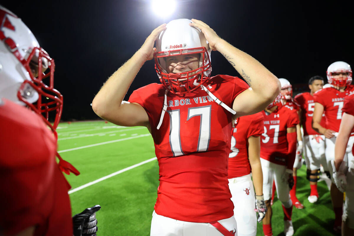 Arbor View's quarterback Kyle Holmes (17) celebrates after defeating Desert Pines 22-21 in a fo ...