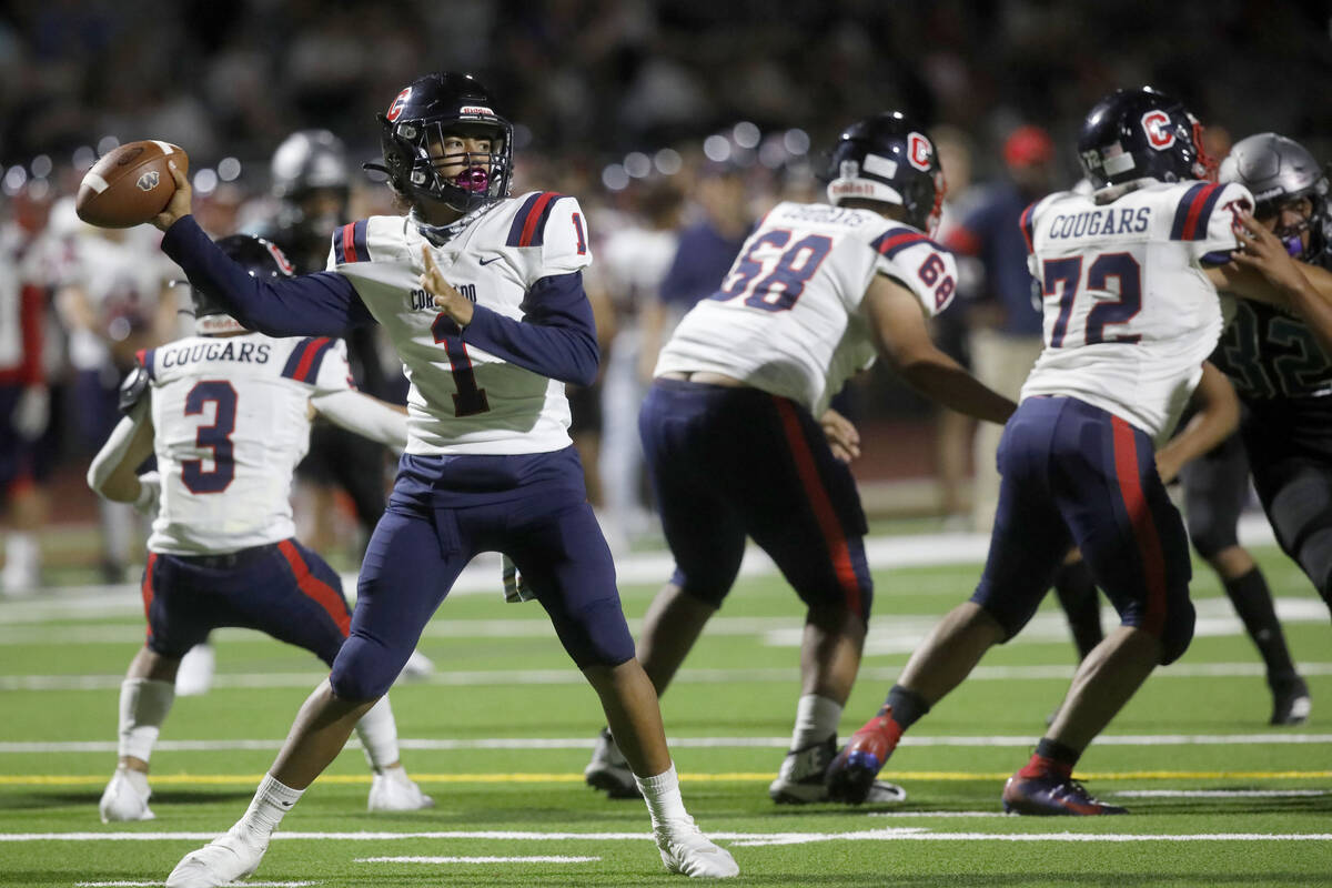 Coronado High School's Joshua Andrade (1) throws a pass against Silverado High School during th ...