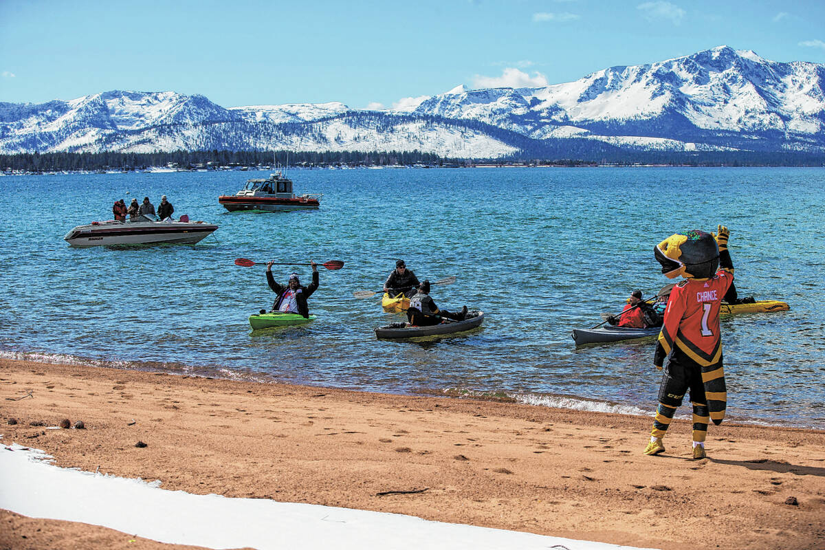 Vegas Golden Knights mascot Chance waves to kayakers and boaters near Edgewood Tahoe Resort in ...