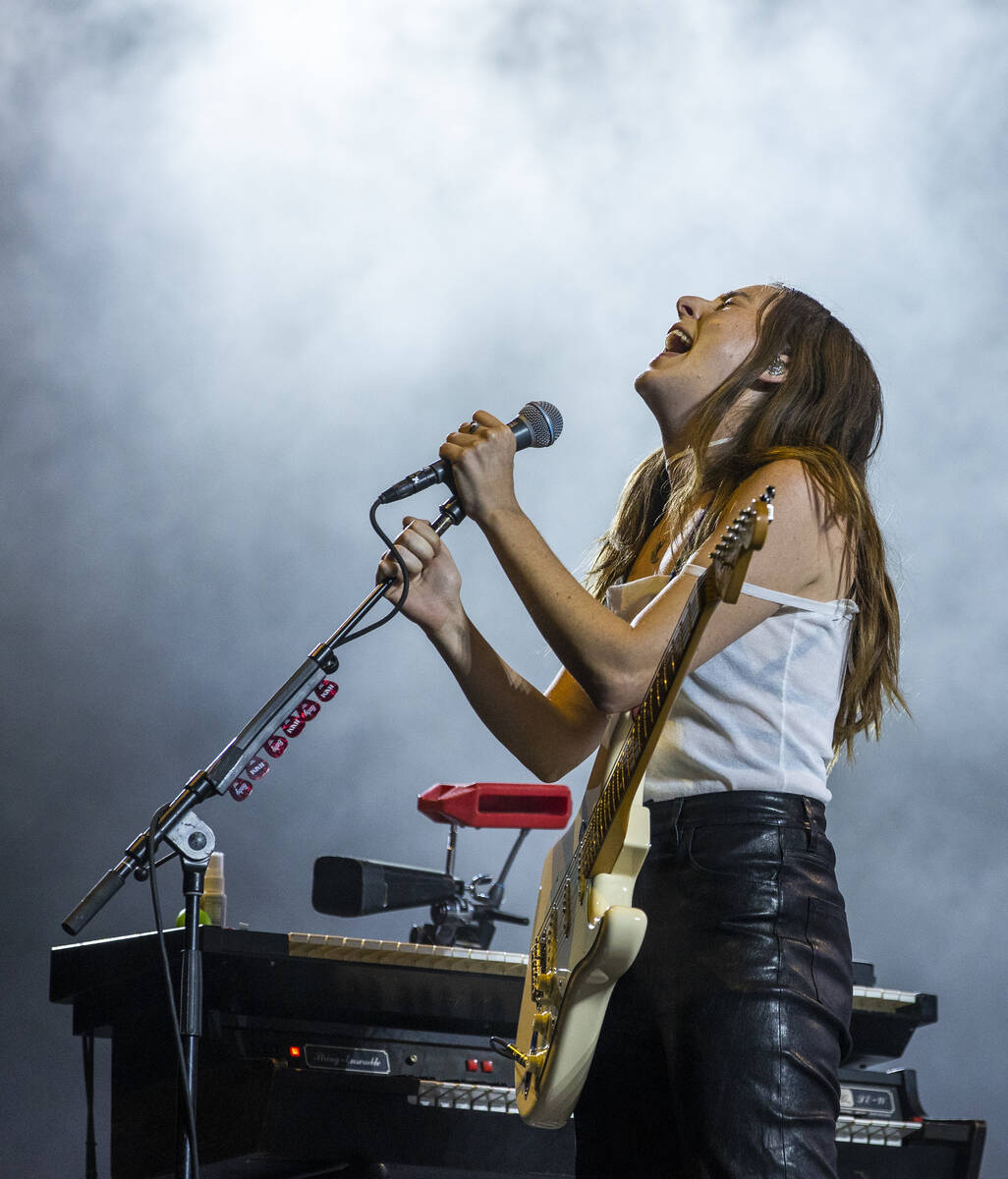 Danielle Haim sings as family band HAIM performs on the Downtown Stage during day two of Life i ...
