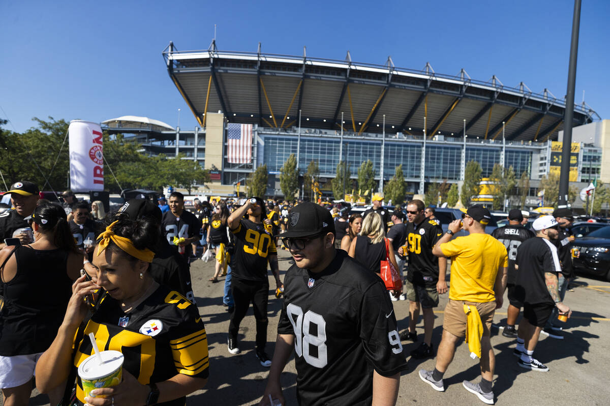 Raiders and Steelers fans at Heinz Field before the start of an NFL football game on Sunday, Se ...