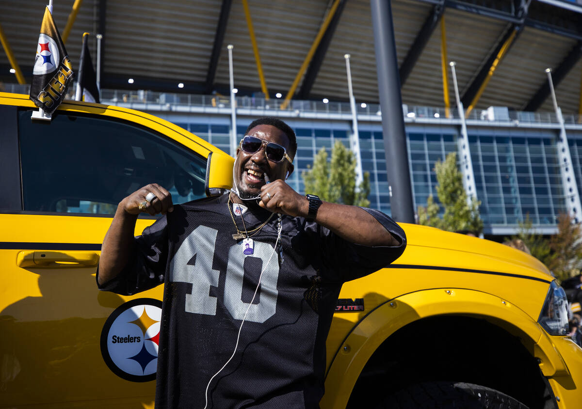 Raiders fan Tyron Abbington at Heinz Field before the start of an NFL football game against the ...