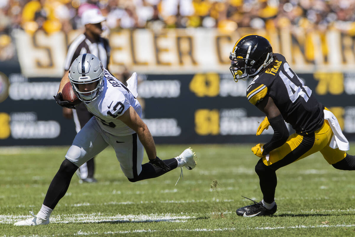 Raiders wide receiver Hunter Renfrow (13) breaks up field past Pittsburgh Steelers cornerback J ...