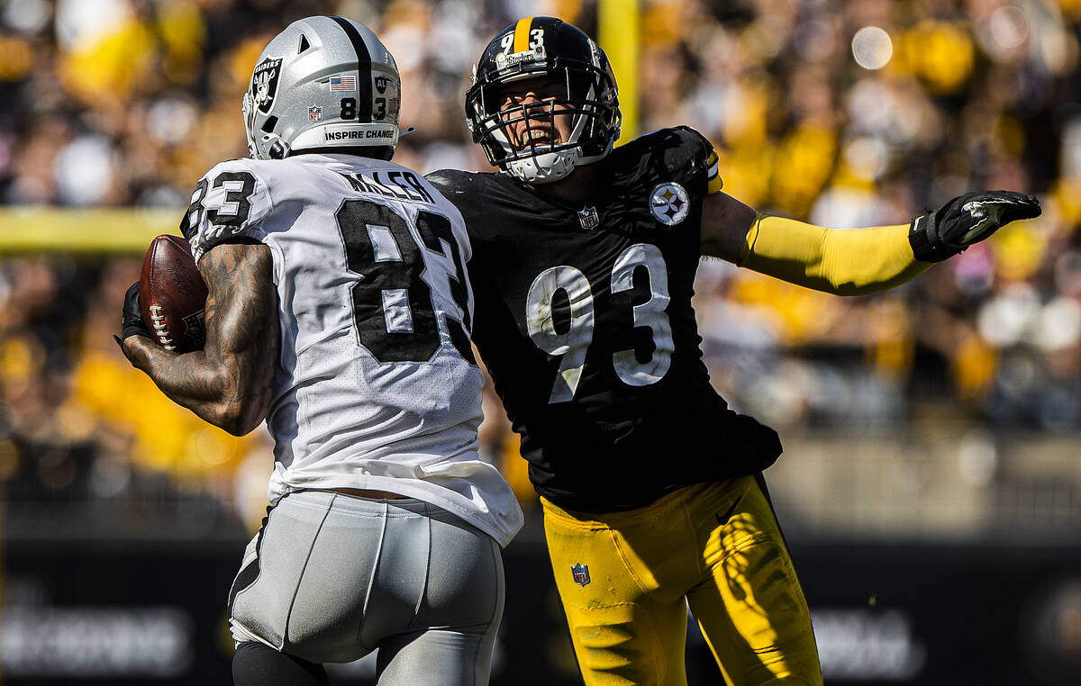 Raiders tight end Darren Waller (83) makes a big catch past Pittsburgh Steelers middle lineback ...