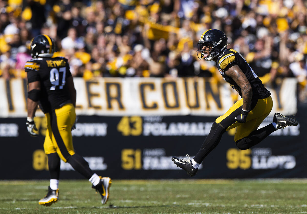 Pittsburgh Steelers cornerback Cameron Sutton (20) celebrates a big defensive stop with Pittsbu ...