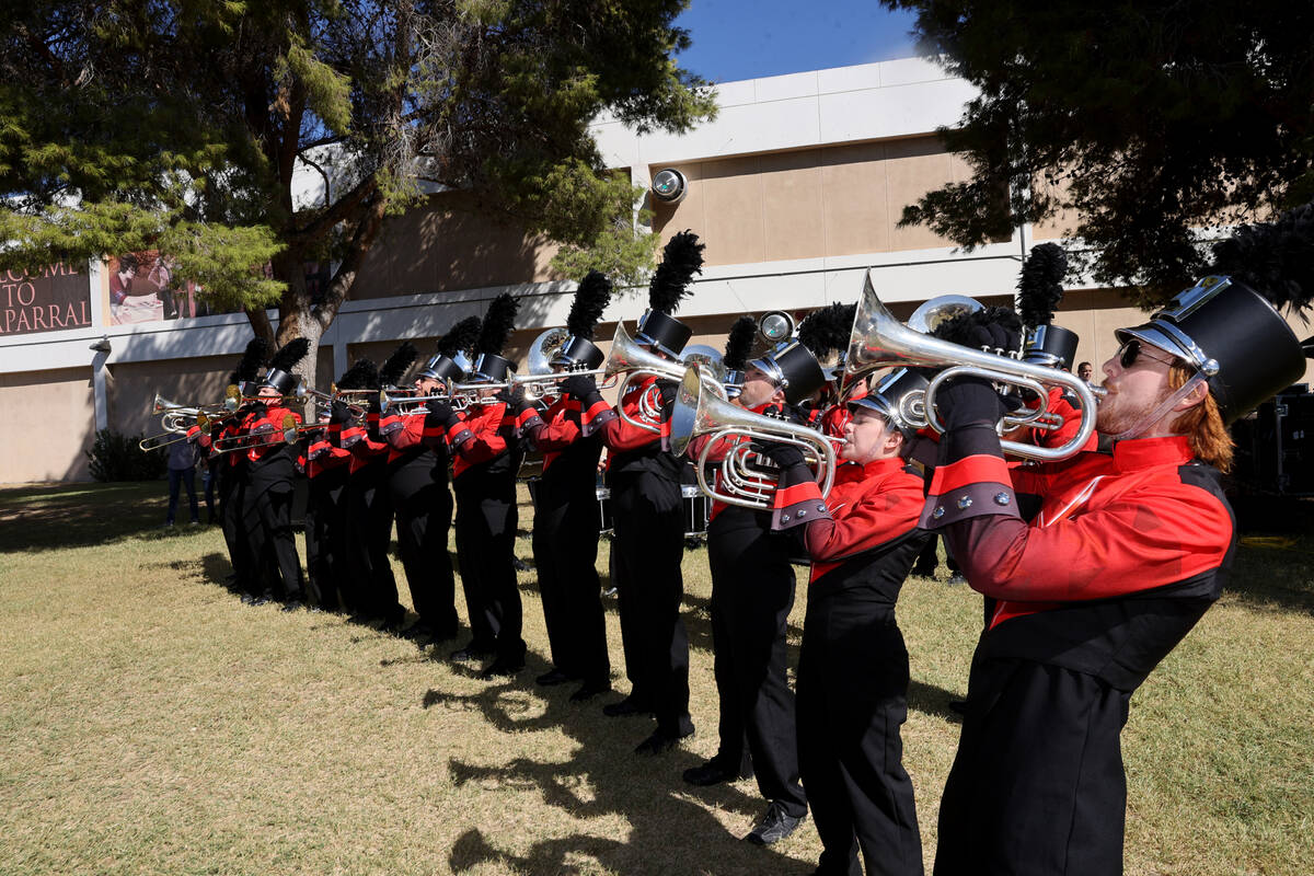 The UNLV marching band honors World War II veteran Vincent Shank on his 105th birthday at Chapa ...