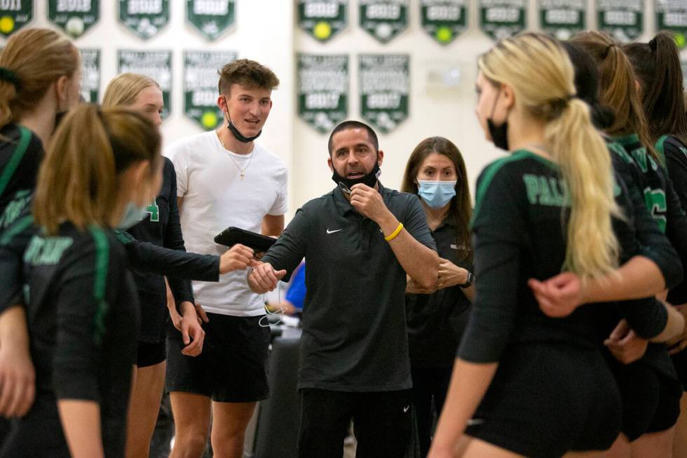 Palo Verde's head coach Phil Clarke speaks to his team in between games against Shadow Ridge at ...