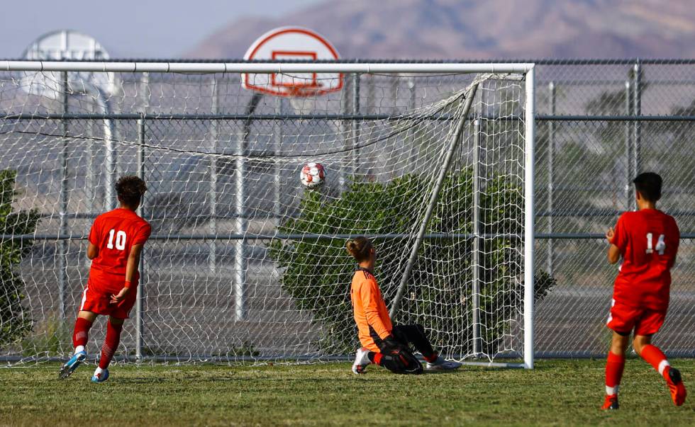 Southeast Career Tech's Jose Lopez, not pictured, gets a goal past Spring Valley's Ryan Sheehan ...