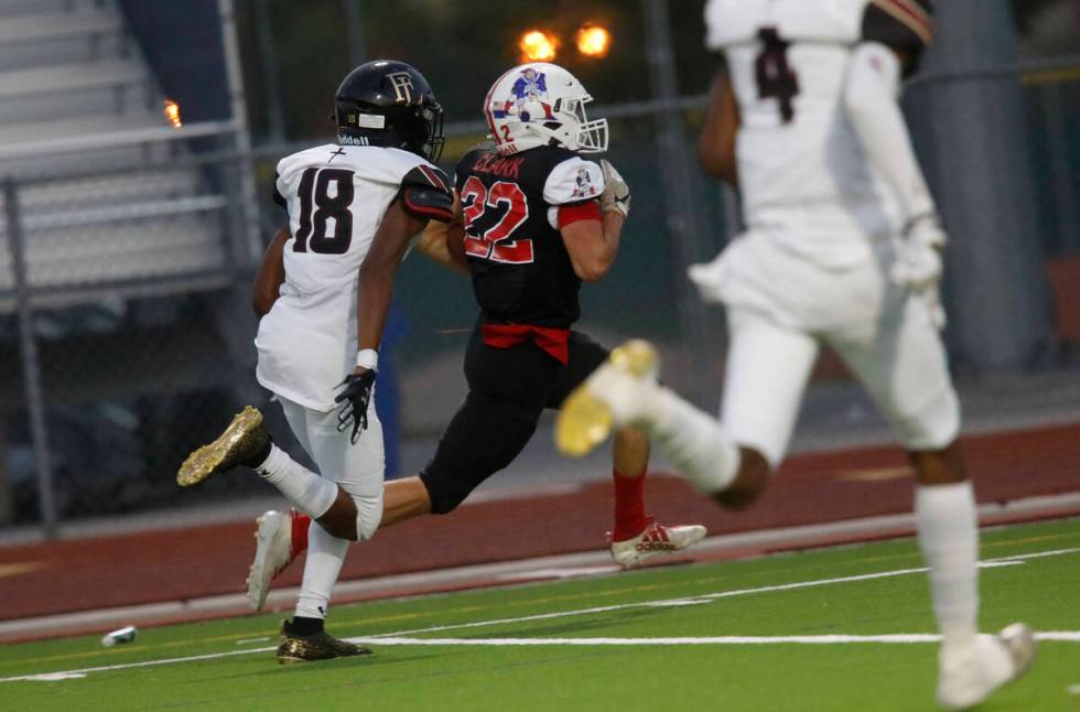 Liberty High School's Brody Clark (22) runs into the end zone for a touchdown during the first ...