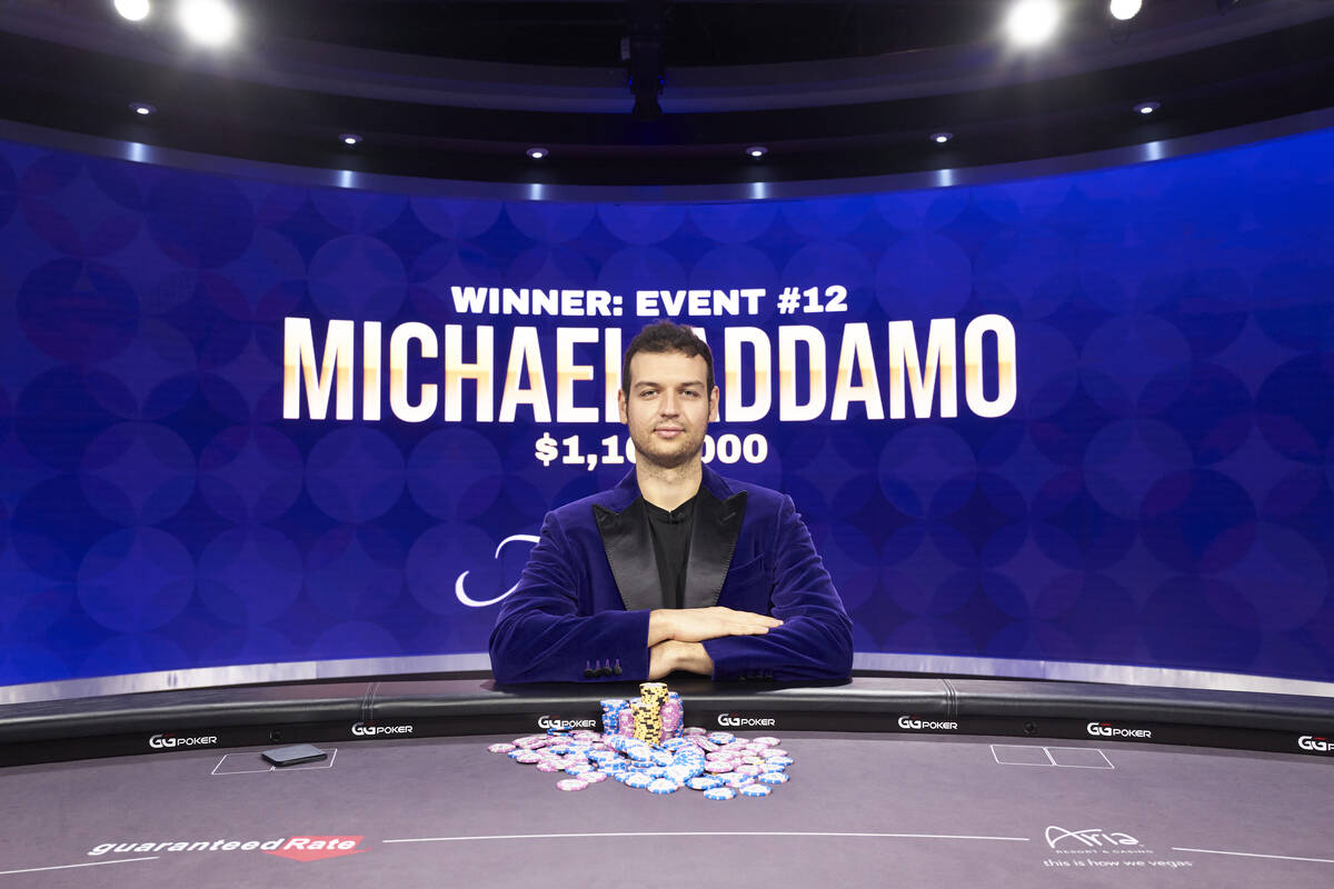 Michael Addamo wears the purple jacket of the Poker Masters champion after winning the final ev ...