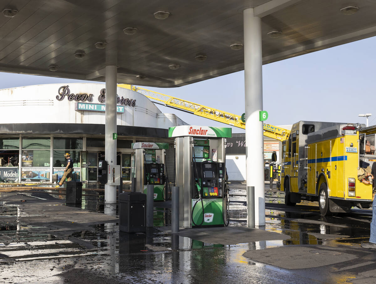 Clark County firefighters on the scene of a fire that damaged Pecos Express convenience store o ...