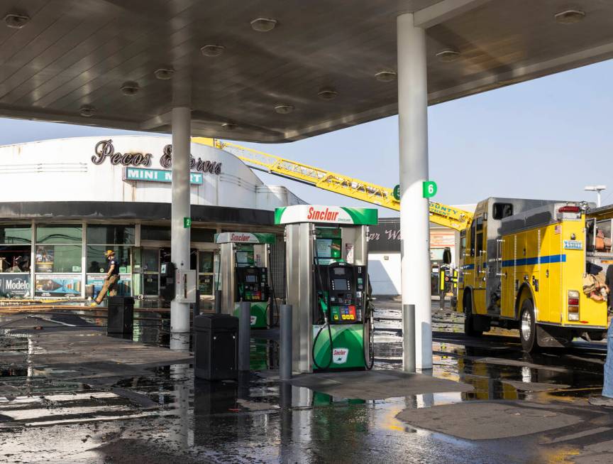 Clark County firefighters on the scene of a fire that damaged Pecos Express convenience store o ...