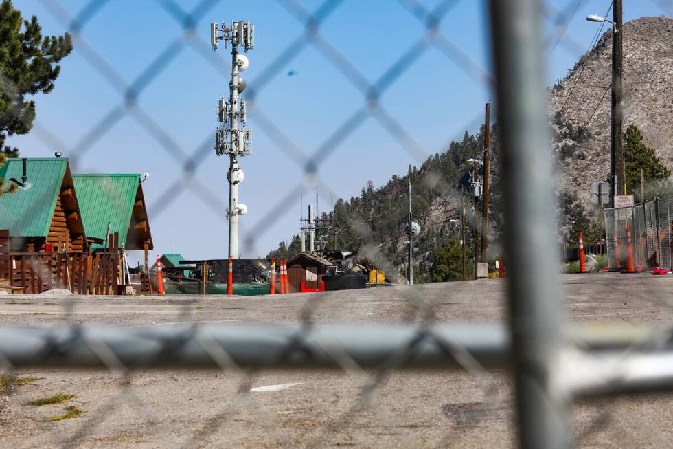 Debris of the former Mount Charleston Lodge is fenced off on Monday, Sept. 20, 2021. (Rachel As ...