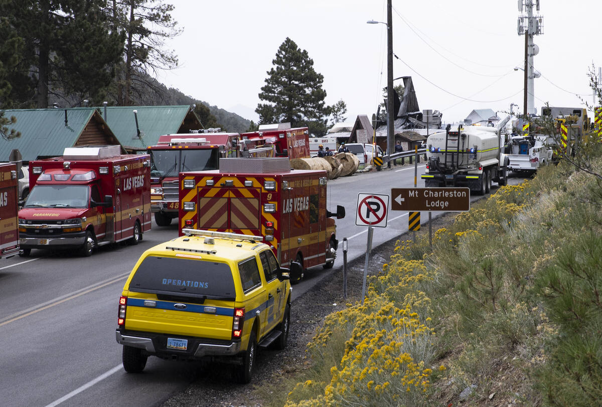 Firefighters battle a blaze at Mount Charleston Lodge on Friday, Sep. 17, 2021. (Bizuayehu Tesf ...