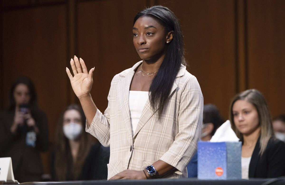 United States Olympic gymnast Simone Biles is sworn in during a Senate Judiciary hearing about ...