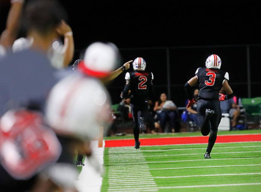 Liberty High School's Germie Bernard (2) runs into the end zone for a touchdown during the seco ...