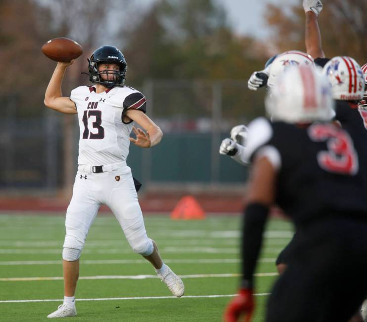 Faith Lutheran High School's quarterback Rylan Walter (13) throws a pass against Liberty High S ...