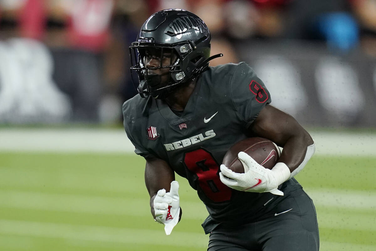 UNLV running back Charles Williams (8) plays against Iowa State during the second half of an NC ...