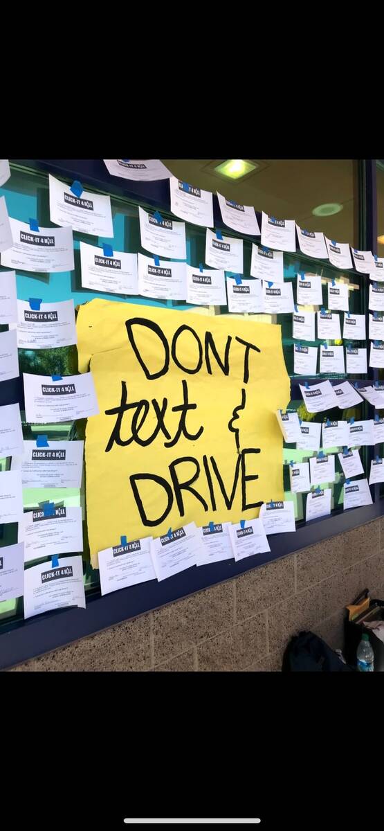 A message that reads "Don't text and drive" is displayed at Shadow Ridge High School. The schoo ...
