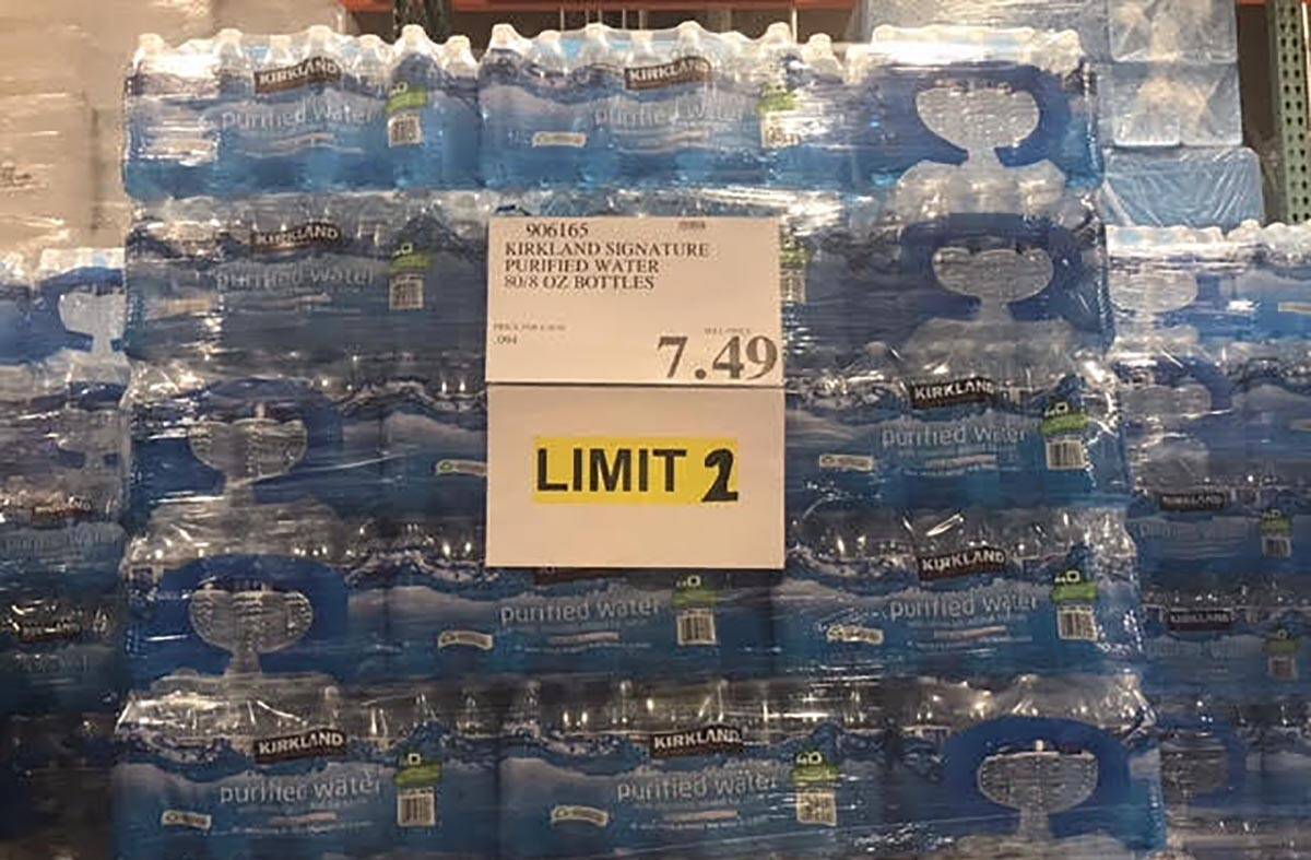 Customers can only purchase two packages of water at Costco's Summerlin store per a sign observ ...