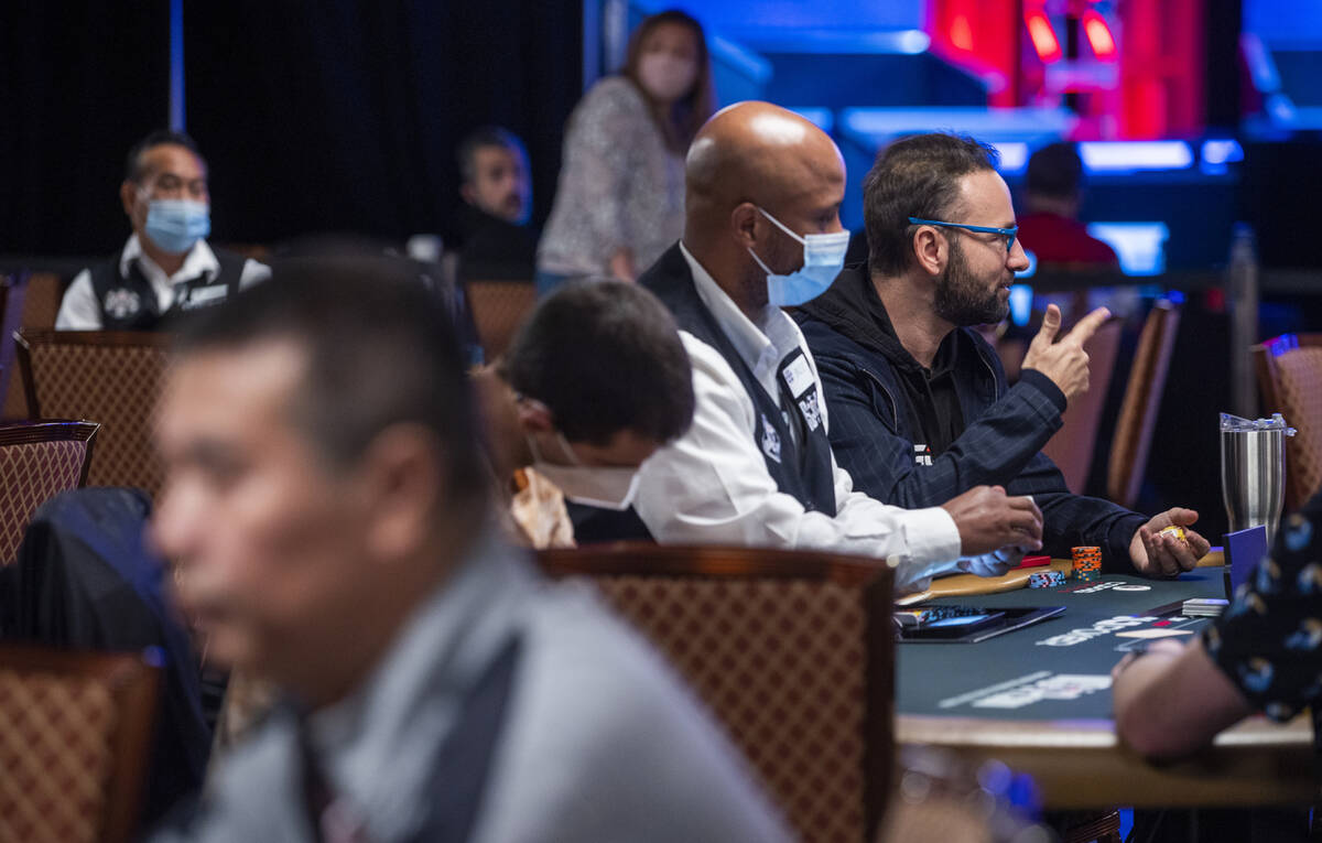 Professional poker player Daniel Negreanu, right, plays in the $25,000 buy-in HORSE event on th ...
