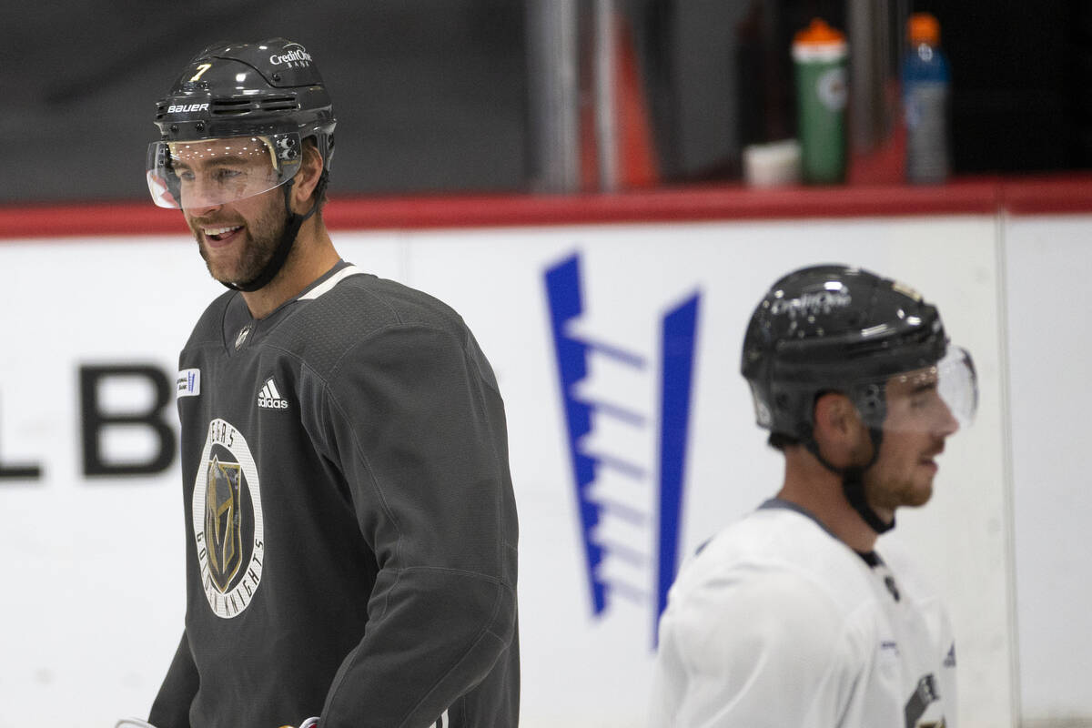 Golden Knights defenseman Alex Pietrangelo (7) and right wing Reilly Smith (19) laugh as they s ...