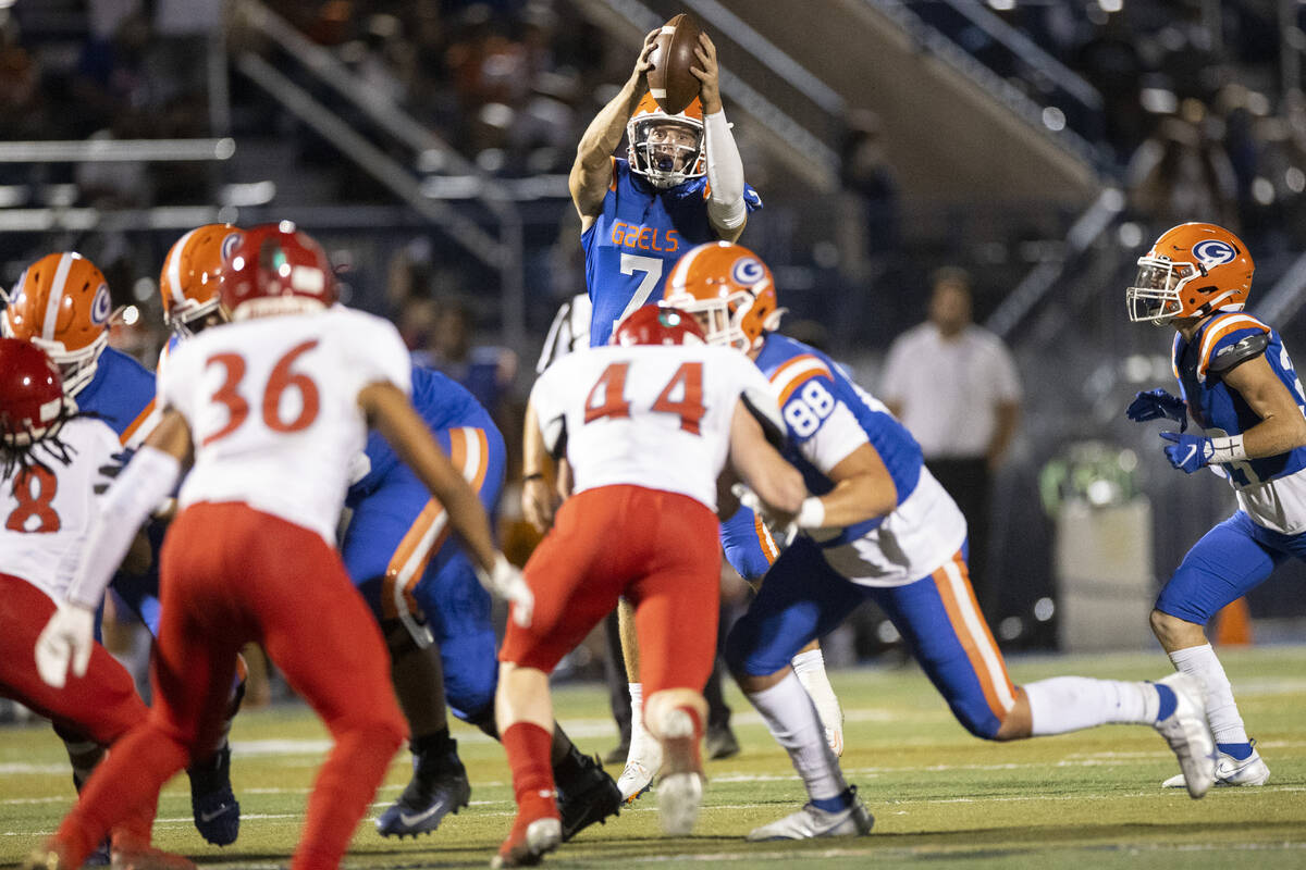 Bishop Gorman's Styles Stockham (7) catches a high hike during the second half of a football ga ...