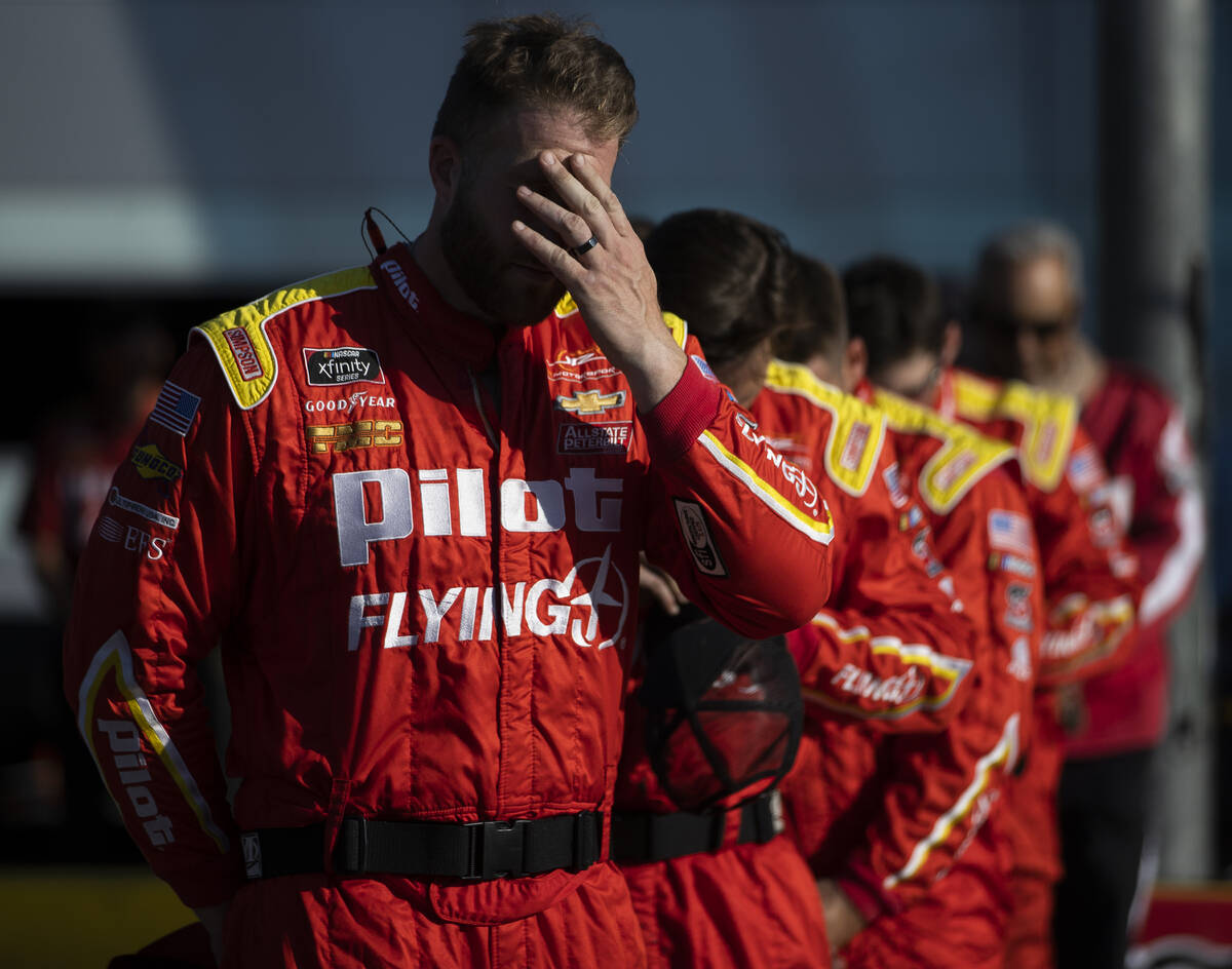 Pit crews try and stay cool during the Alsco Uniforms 302 NASCAR Xfinity series race on Saturda ...