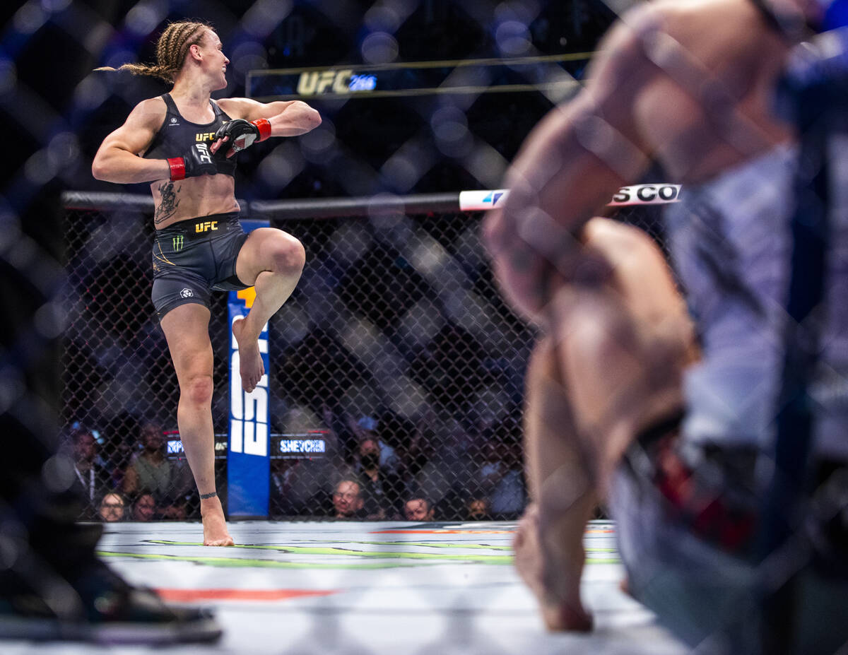 Valentina Shevchenko does a pirouette after knocking out Lauren Murphy in the fourth round of t ...
