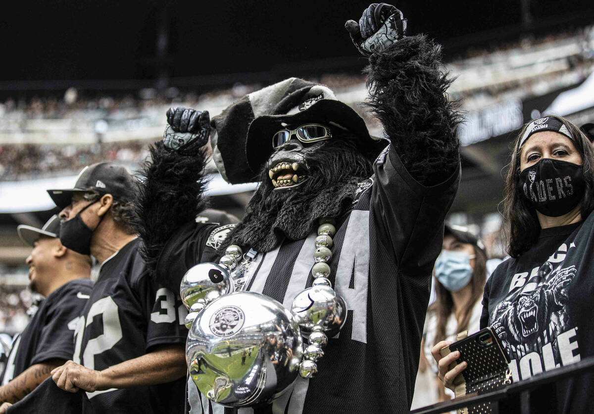 Raiders fans during an NFL football game against the Miami Dolphins on Sunday, Sept. 26, 2021, ...