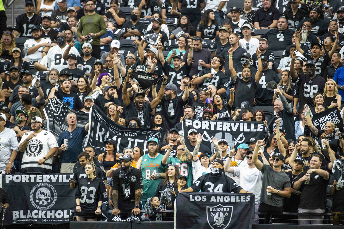 Raiders fans in the stands during the first half of their NFL game versus the Miami Dolphins at ...
