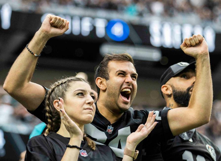 Raiders fans during an NFL football game against the Miami Dolphins on Sunday, Sept. 26, 2021, ...