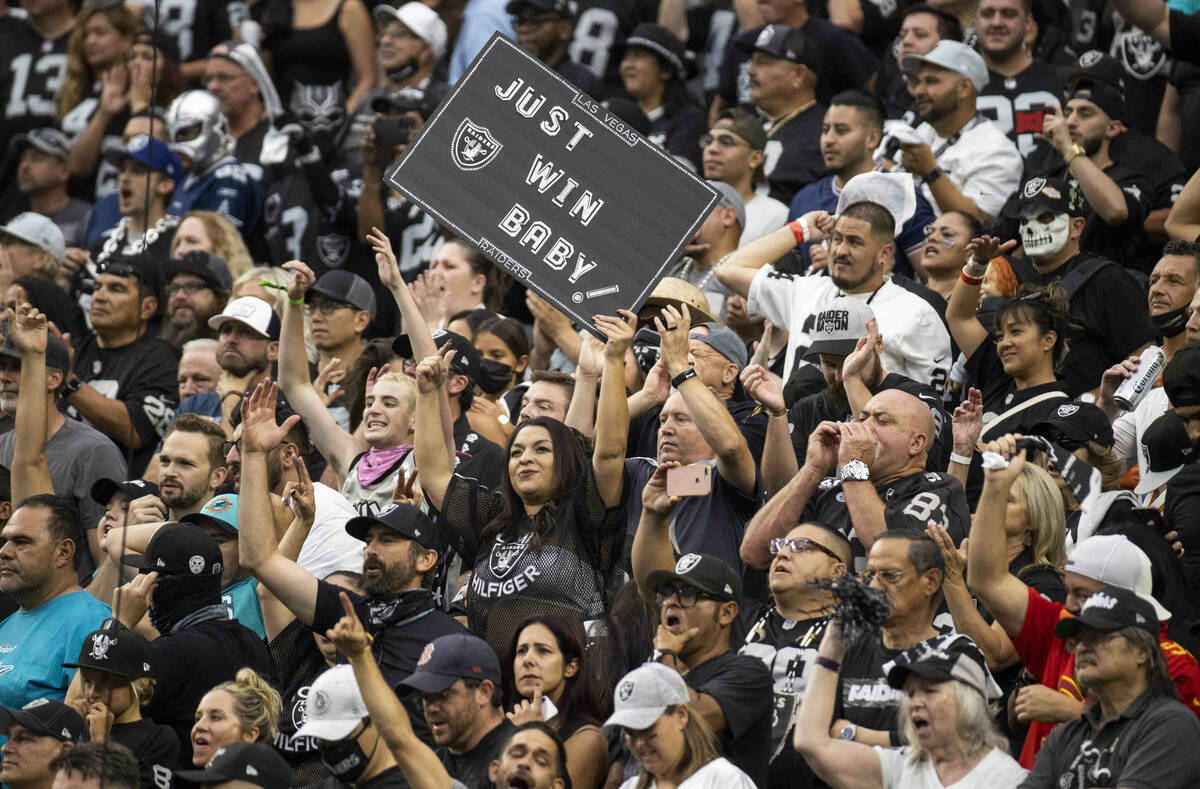 Raiders fans in the stands during the second half of their NFL game versus the Miami Dolphins a ...