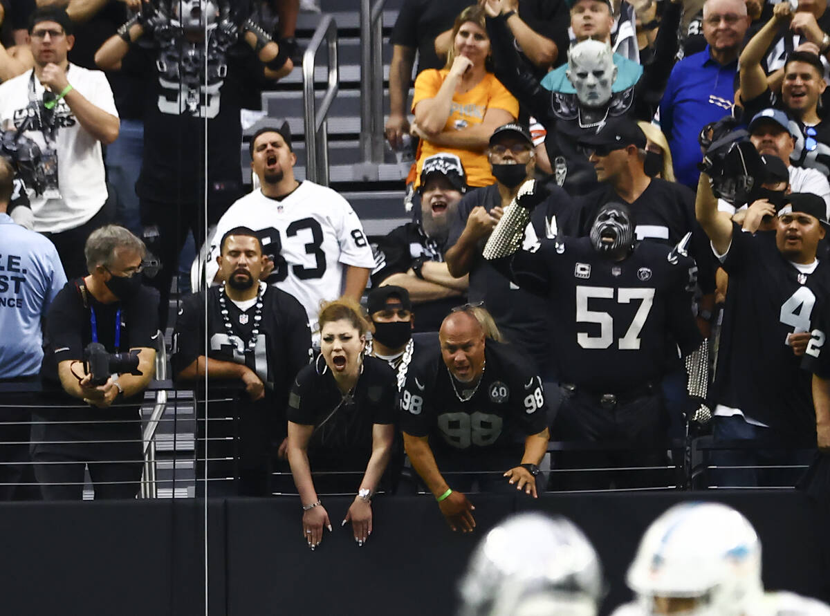 Raiders fans cheer during the second half of NFL game against the Miami Dolphins at Allegiant S ...