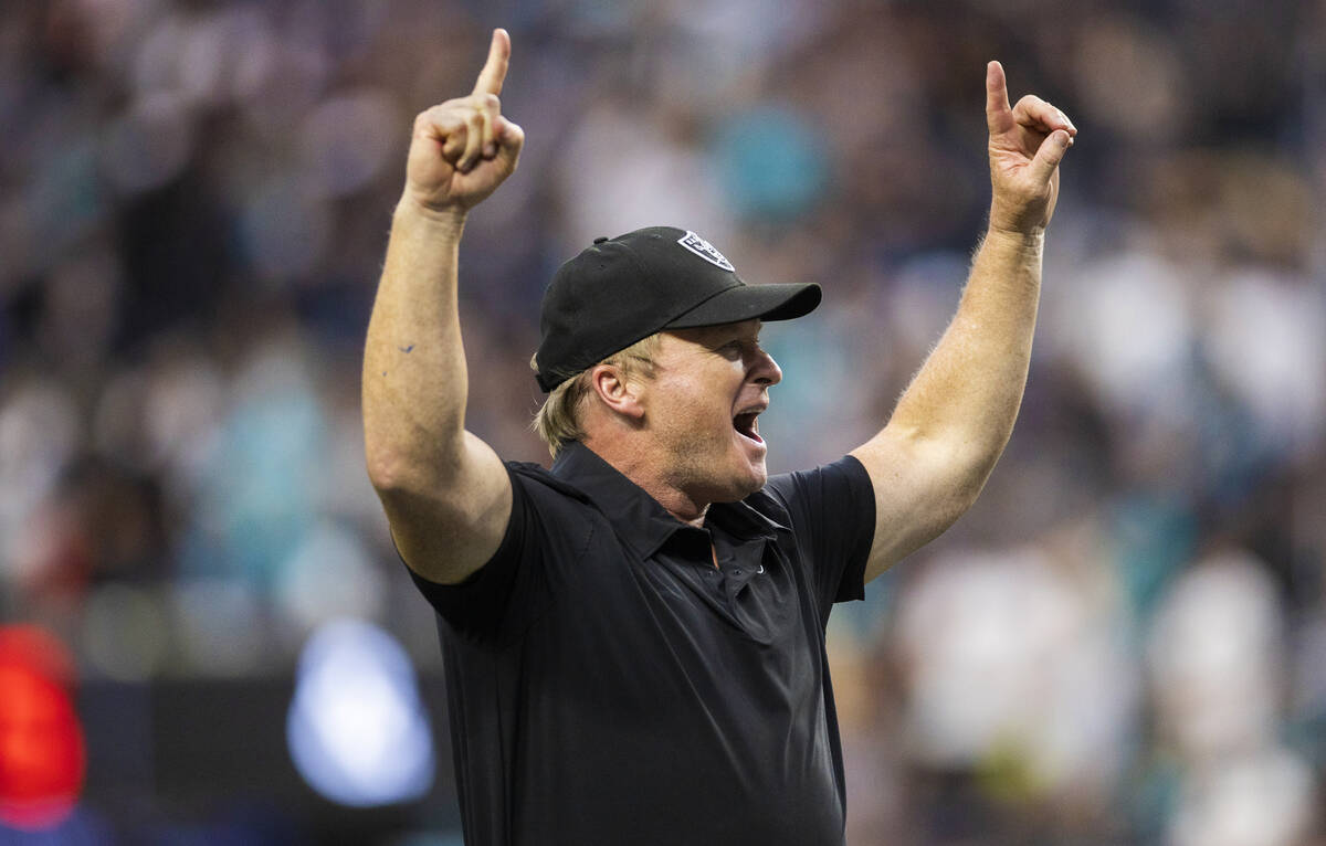 Las Vegas Raiders head coach Jon Gruden celebrates after beating the Miami Dolphins at the end ...