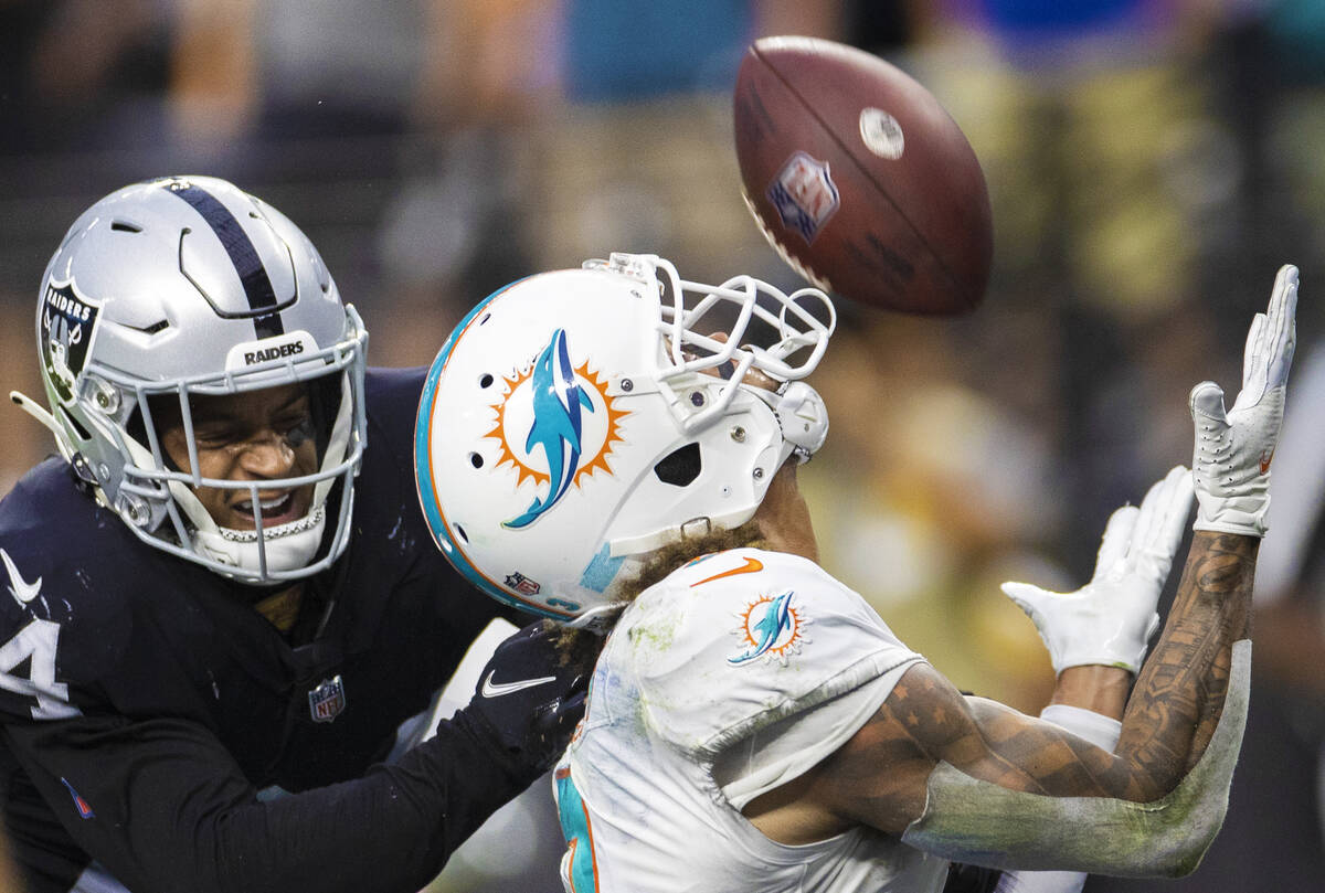 Las Vegas Raiders defensive back Johnathan Abram (24) breaks up a pass intended for Miami Dolph ...