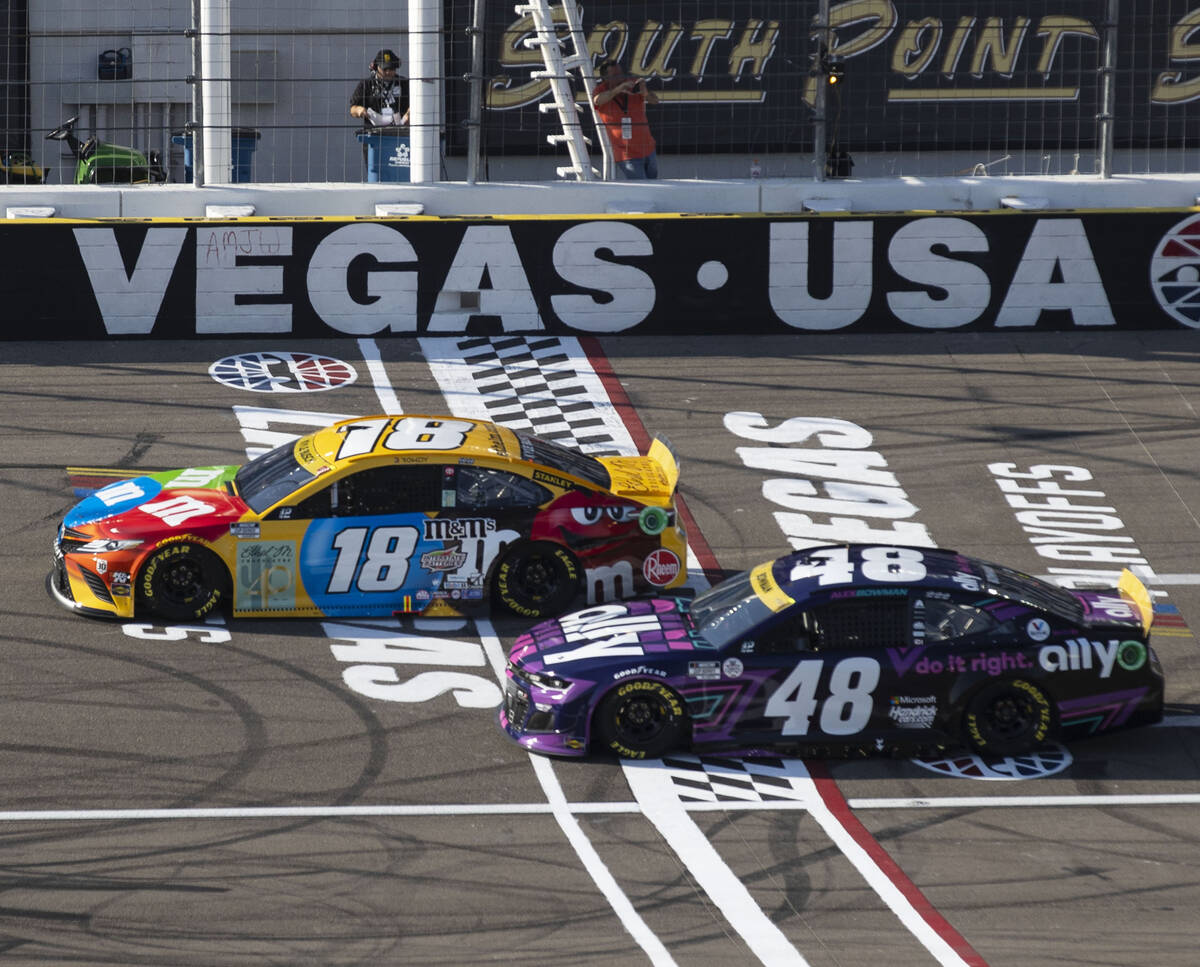 Kyle Busch (18) and Alex Bowman (48) race during the 4th Annual South Point 400 race at Las Veg ...