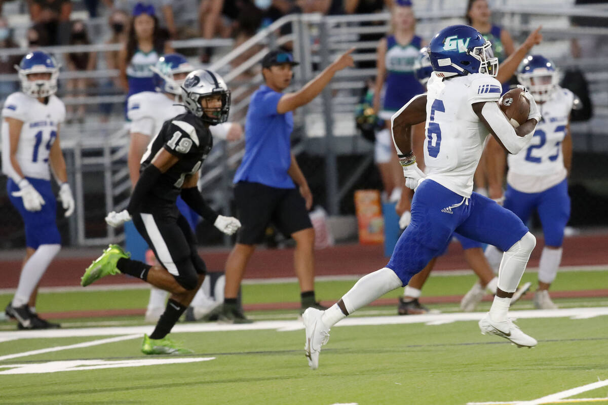 Green Valley High School's Jaylen McKnight (6) runs into the end zone for a touchdown during th ...