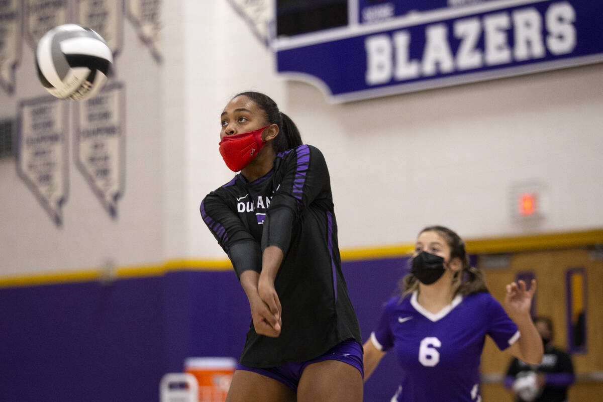 Durango's Sydney Wilkes (7) bumps during a high school volleyball game against Faith Lutheran a ...