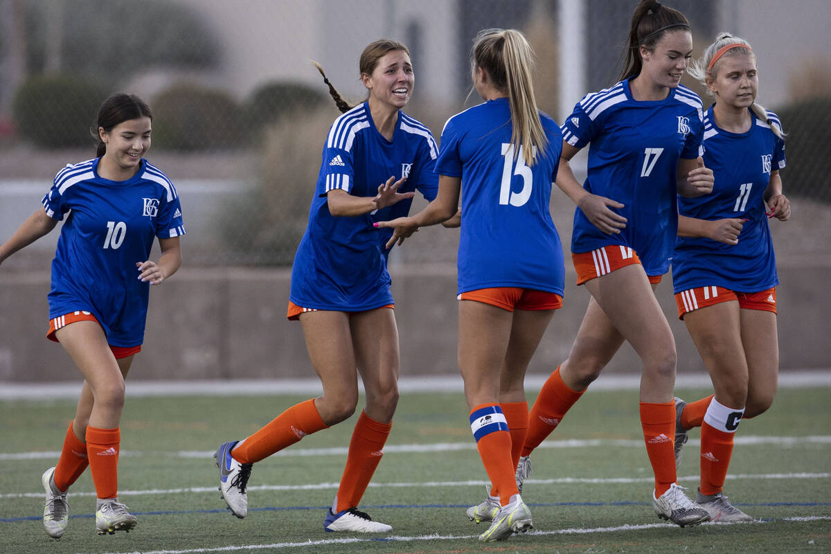 Bishop Gorman's Gabby Dilandri, second left, (9) celebrates her goal with her teammates during ...
